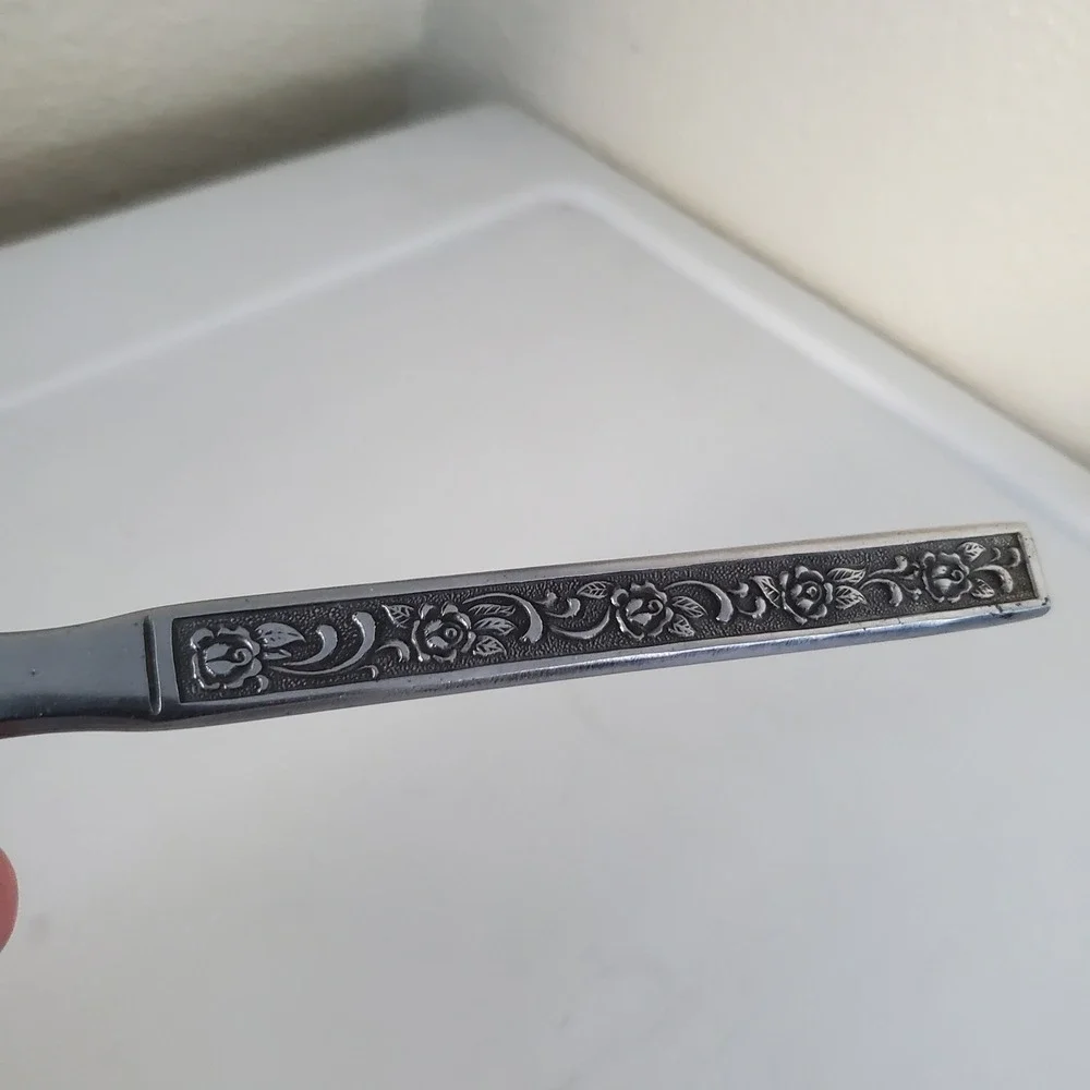 Nasco Stainless Japan Dinner Knife Vintage Floral Rose Blackened Handle Serrated